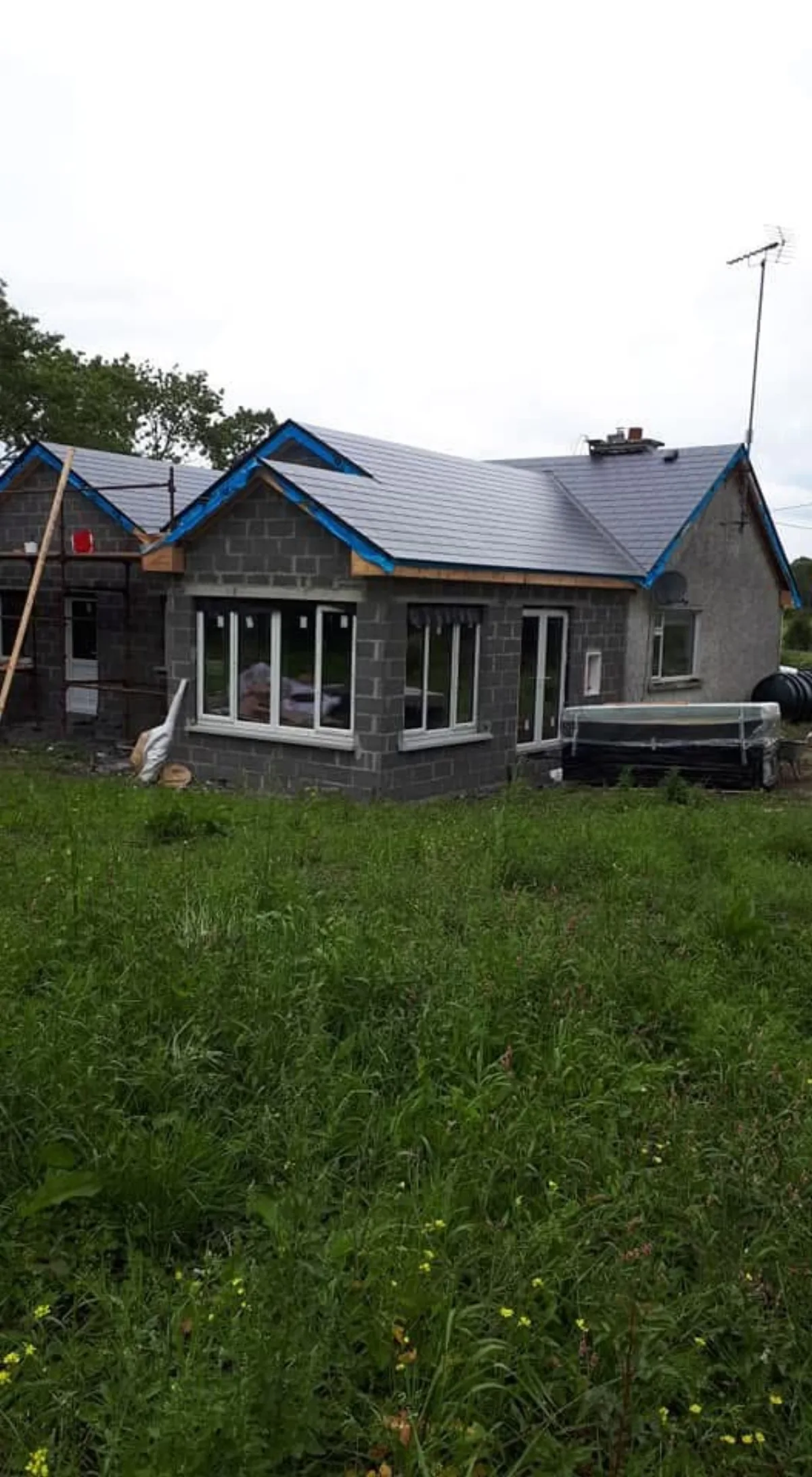 Single-storey extension with a new tiled pitched roof in Great Notley, Essex