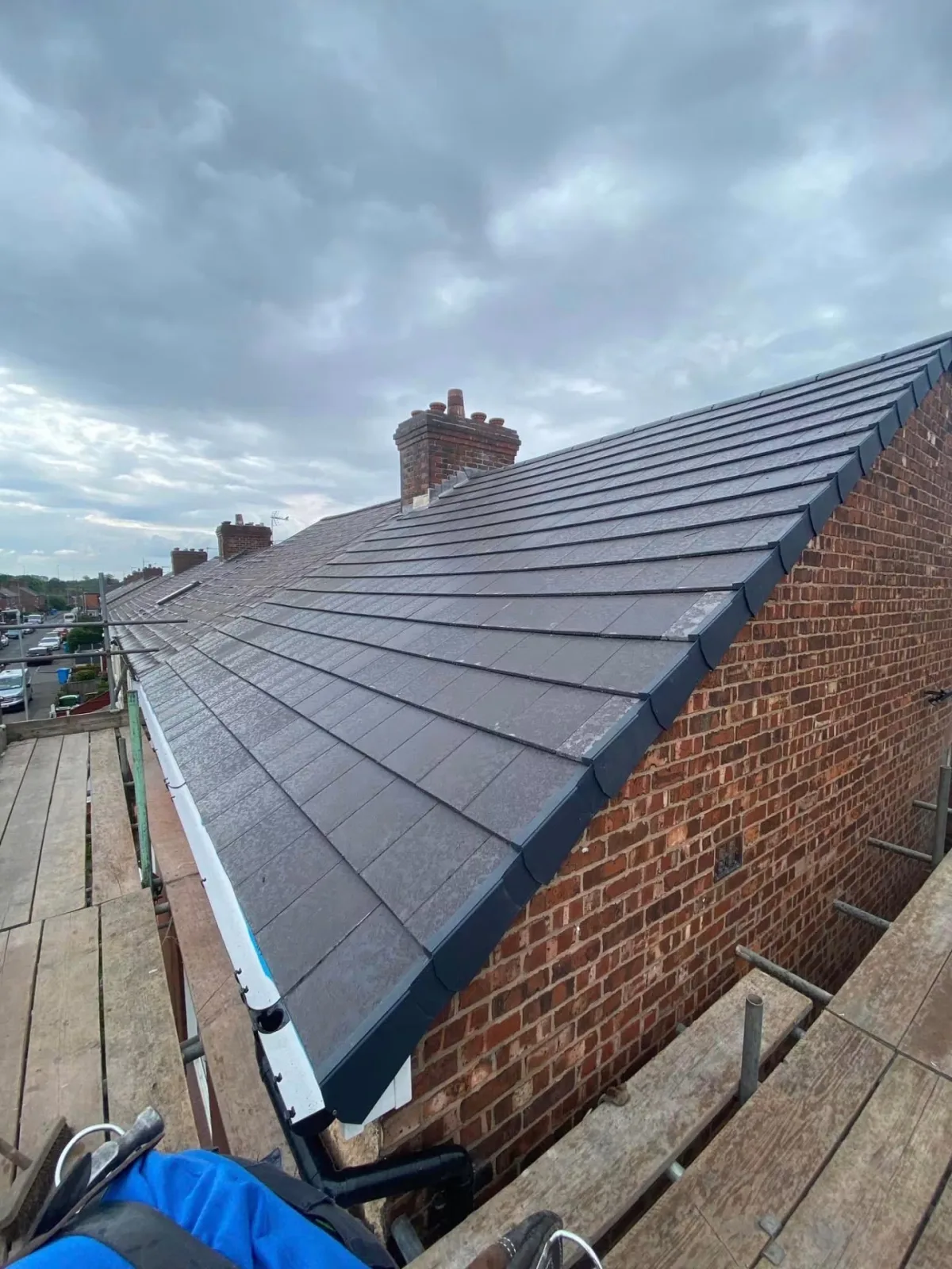 Completed natural slate re-roof with dry ridge system on a Victorian terrace in Bocking, Braintree