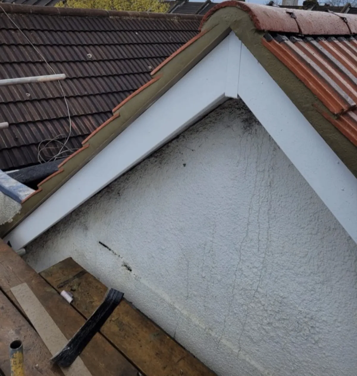 New white UPVC ogee guttering, fascia and soffit fitted to a house in Essex